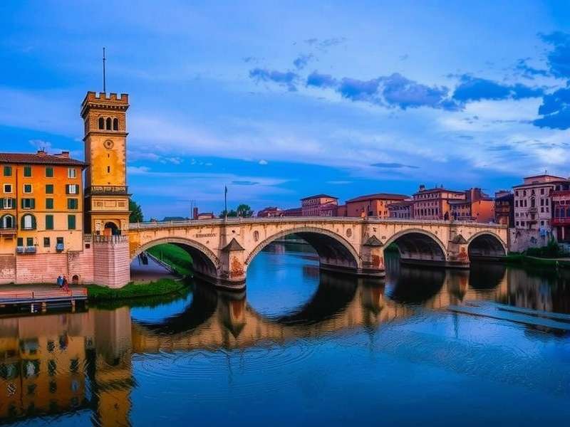 Ponte Pietra – The oldest bridge in Verona spanning the Adige River with Roman arches and medieval towers